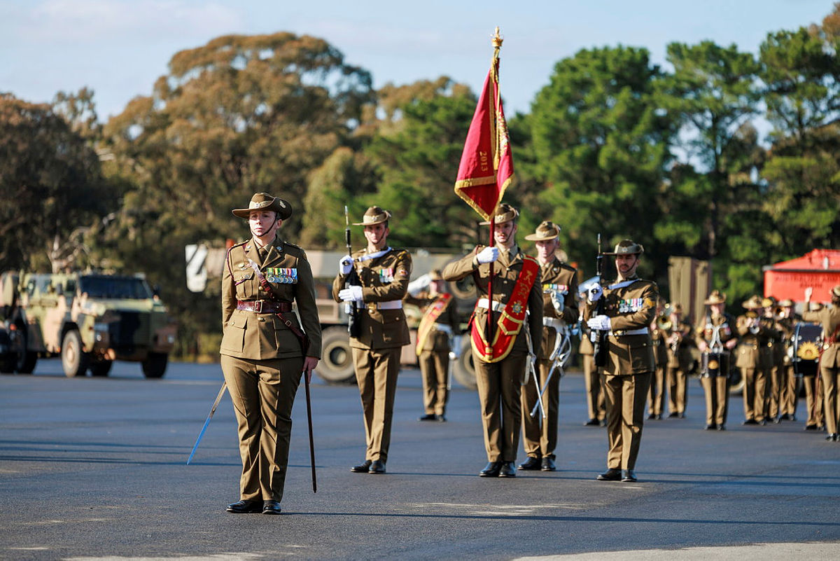 Deputy Head of Corps, Royal Australian Corps of Transport, Lieutenant Colonel Philippa Cleary, conducts a salute during the Corps' 50th Anniversary parade at Puckapunyal Military Area, Victoria.